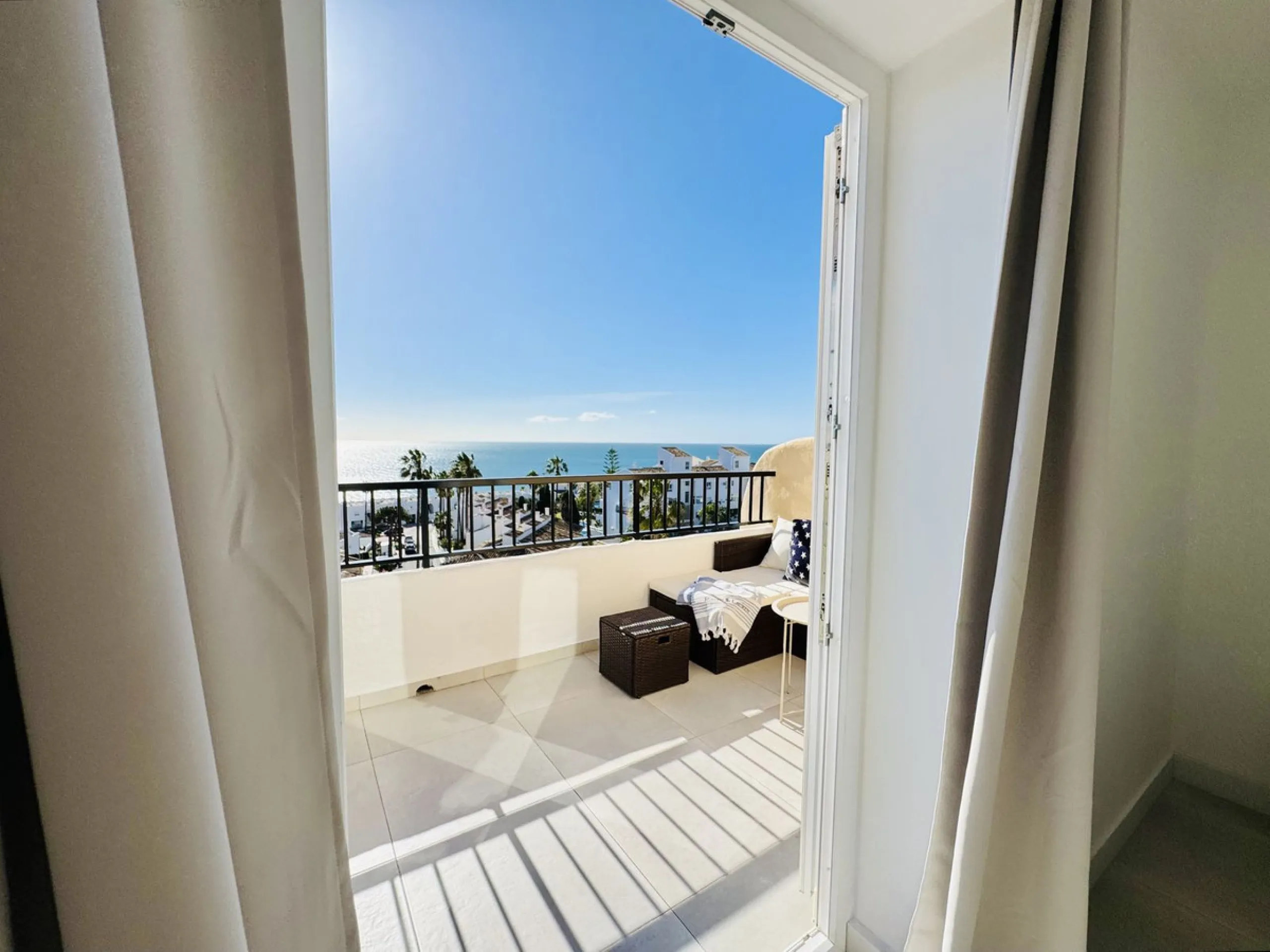 Stylish, fully renovated townhouse in the heart of Mijas Costa just steps from Fuengirola's beach walk, ideal as a permanent home, holiday residence or investement with excellent rental potential.