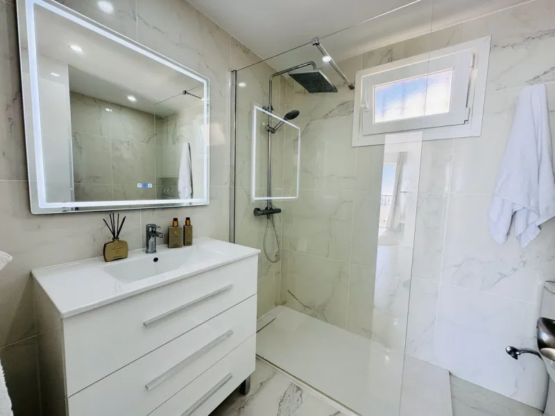 Stylish, fully renovated townhouse in the heart of Mijas Costa just steps from Fuengirola's beach walk, ideal as a permanent home, holiday residence or investement with excellent rental potential.
