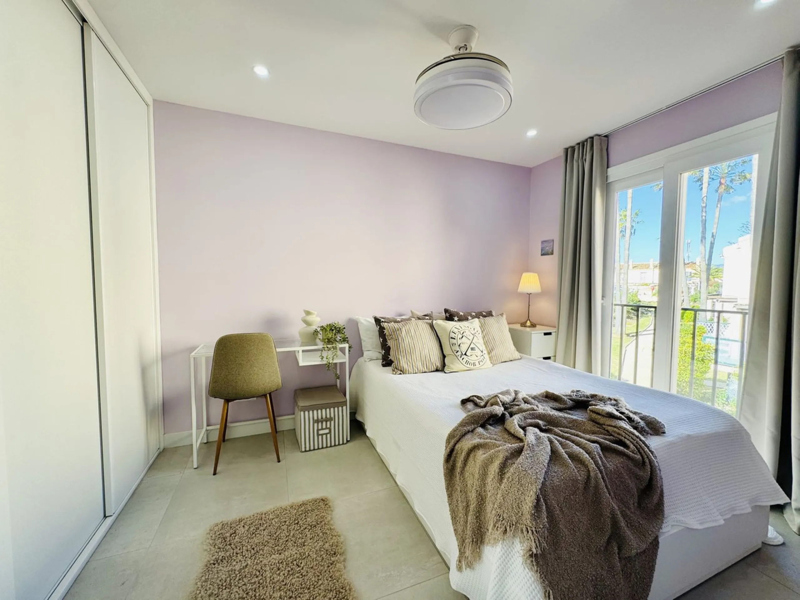 Stylish, fully renovated townhouse in the heart of Mijas Costa just steps from Fuengirola's beach walk, ideal as a permanent home, holiday residence or investement with excellent rental potential.