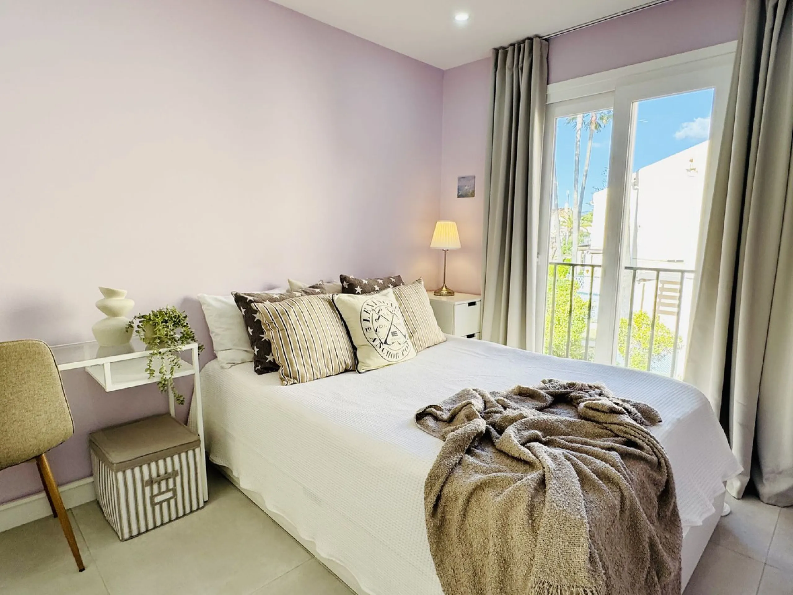 Stylish, fully renovated townhouse in the heart of Mijas Costa just steps from Fuengirola's beach walk, ideal as a permanent home, holiday residence or investement with excellent rental potential.