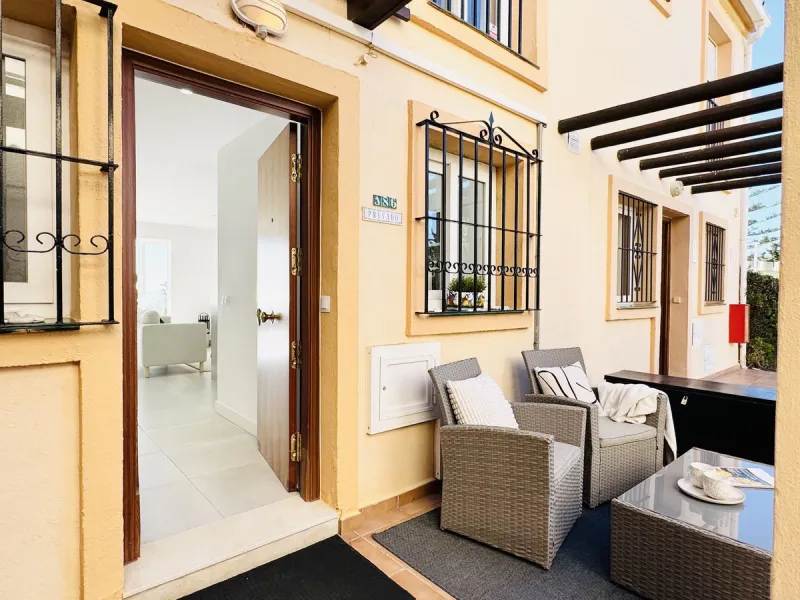 Stylish, fully renovated townhouse in the heart of Mijas Costa just steps from Fuengirola's beach walk, ideal as a permanent home, holiday residence or investement with excellent rental potential.