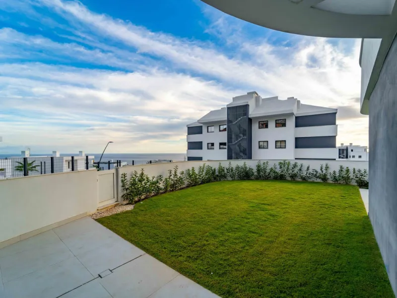 Welcome to a beautifully positioned southwest-facing garden apartment in the heart of Higuerón — a home that offers both privacy and extraordinary views. Located on the eastern corner of the building, this residence is one of only two ground-floor apartme