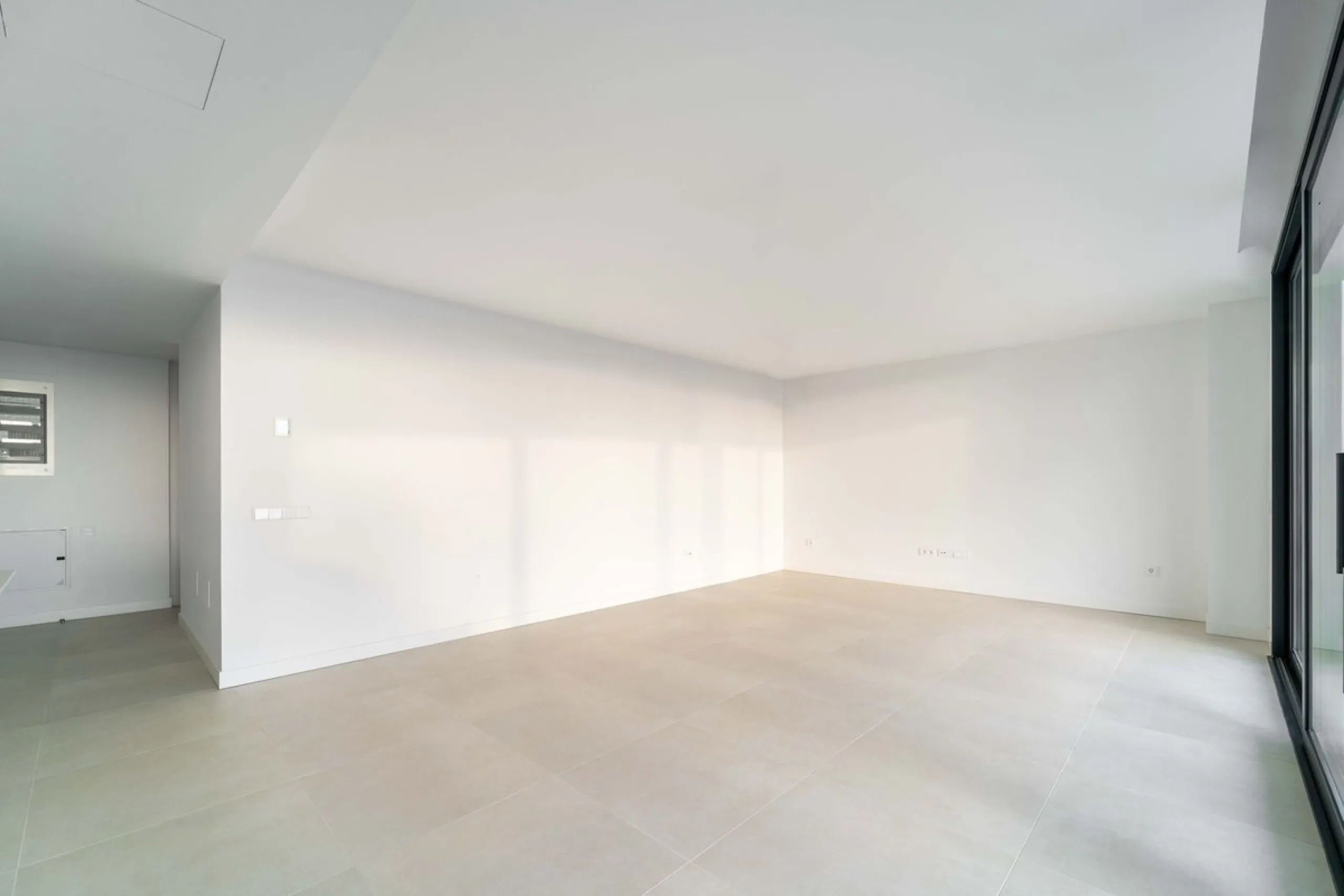 Welcome to a beautifully positioned southwest-facing garden apartment in the heart of Higuerón — a home that offers both privacy and extraordinary views. Located on the eastern corner of the building, this residence is one of only two ground-floor apartme