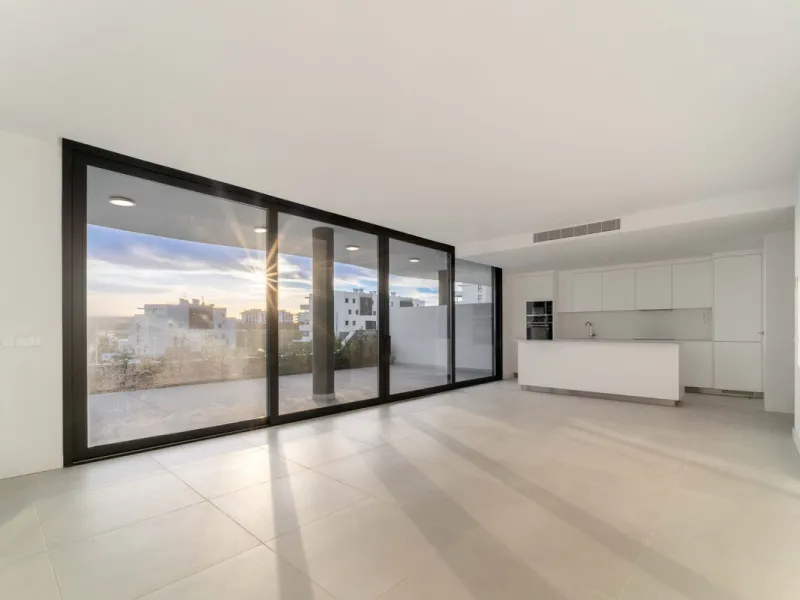 Welcome to a beautifully positioned southwest-facing garden apartment in the heart of Higuerón — a home that offers both privacy and extraordinary views. Located on the eastern corner of the building, this residence is one of only two ground-floor apartme