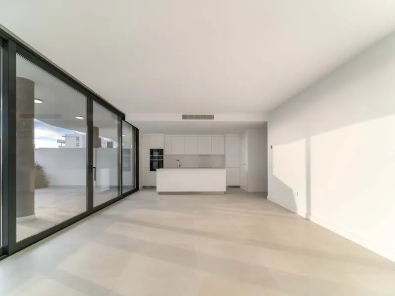 Welcome to a beautifully positioned southwest-facing garden apartment in the heart of Higuerón — a home that offers both privacy and extraordinary views. Located on the eastern corner of the building, this residence is one of only two ground-floor apartme
