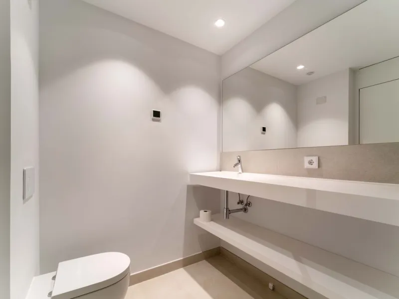 Welcome to a beautifully positioned southwest-facing garden apartment in the heart of Higuerón — a home that offers both privacy and extraordinary views. Located on the eastern corner of the building, this residence is one of only two ground-floor apartme