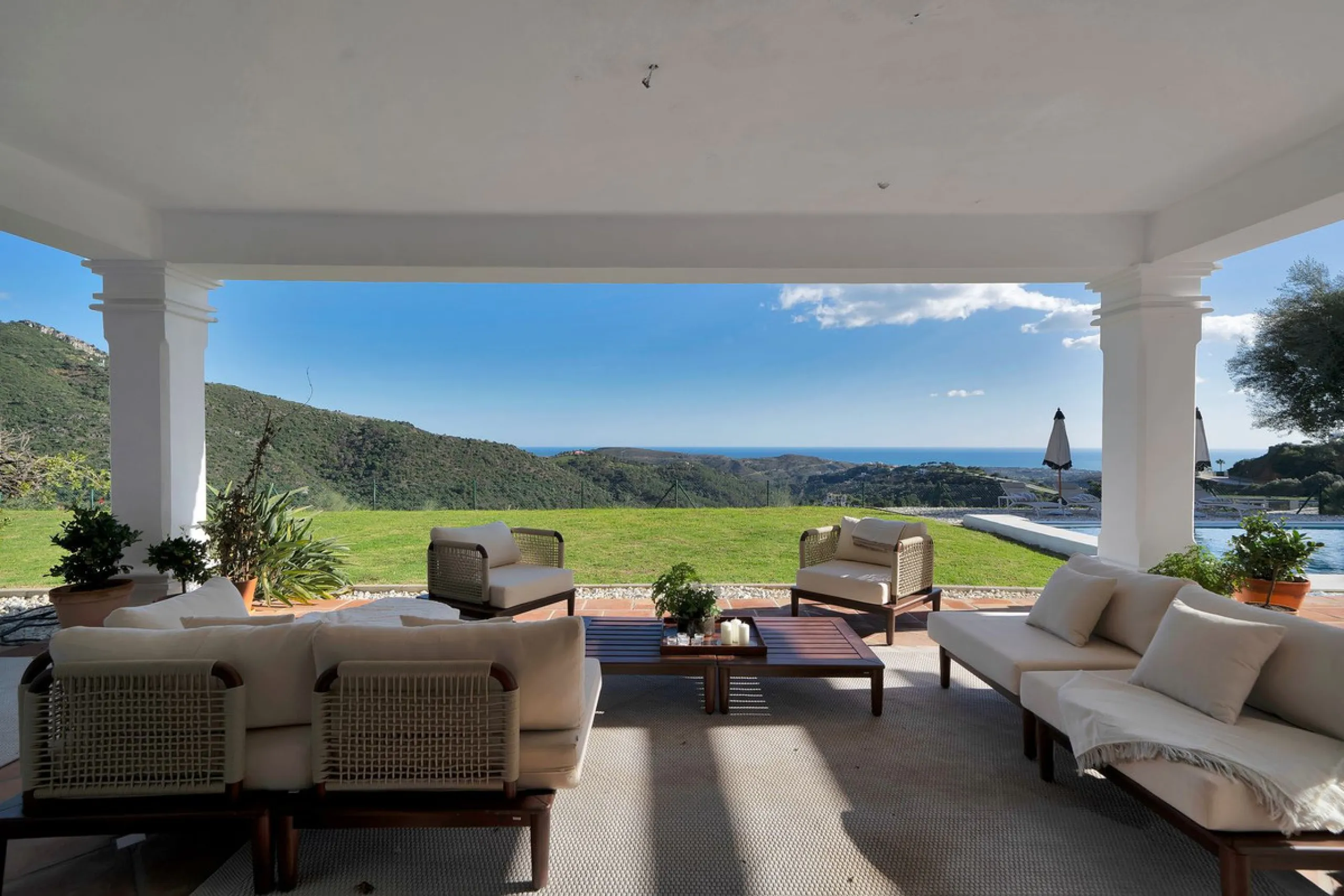 Set within the exclusive gated community of Monte Mayor, this exceptional south-facing detached villa offers breathtaking panoramic sea views from a generous 4,075m² plot. This villa stands out from most due to the elegant combination of Andalucian archit