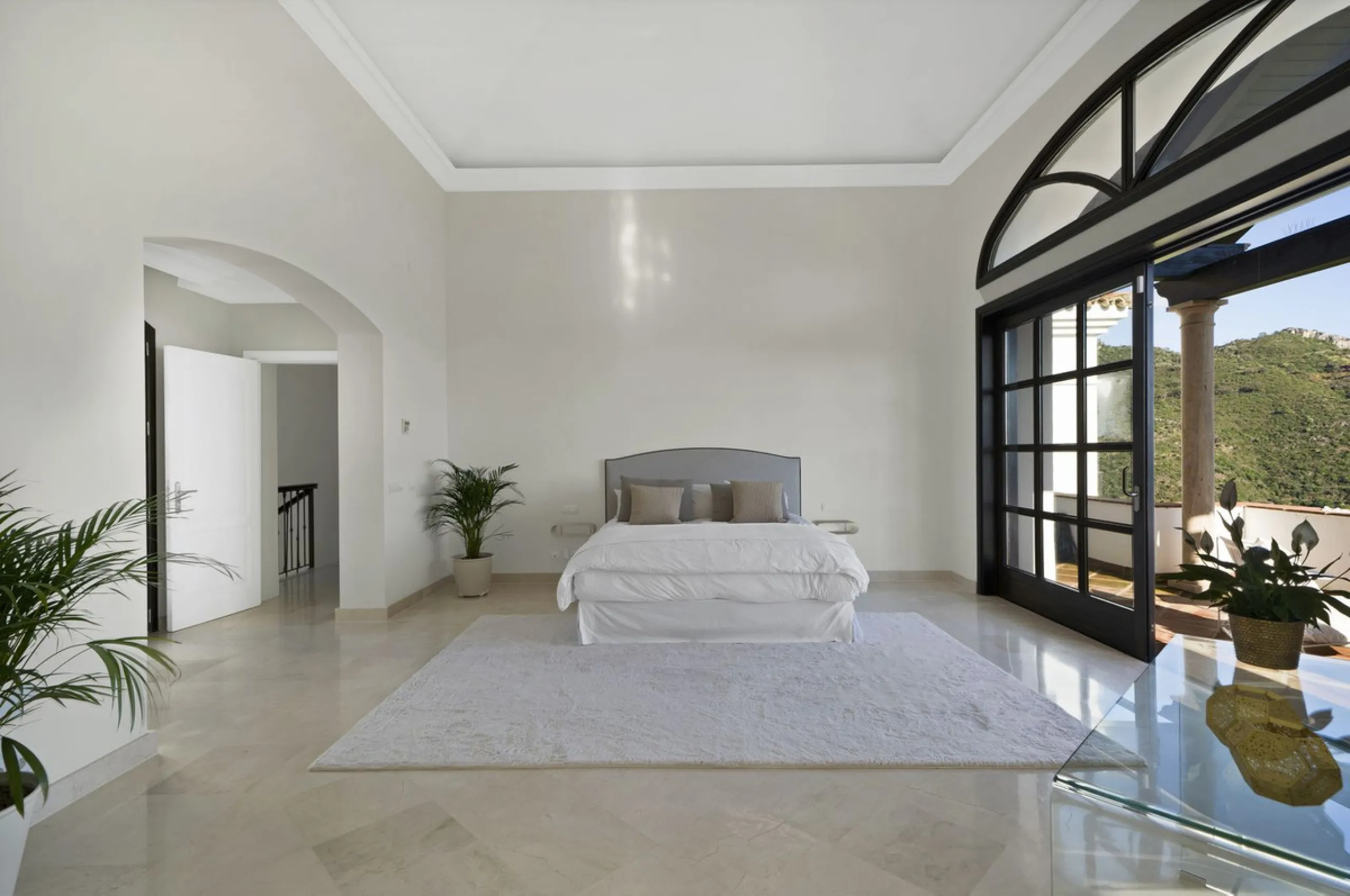 Set within the exclusive gated community of Monte Mayor, this exceptional south-facing detached villa offers breathtaking panoramic sea views from a generous 4,075m² plot. This villa stands out from most due to the elegant combination of Andalucian archit