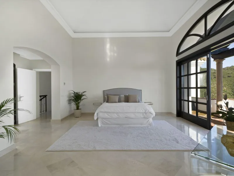 Set within the exclusive gated community of Monte Mayor, this exceptional south-facing detached villa offers breathtaking panoramic sea views from a generous 4,075m² plot. This villa stands out from most due to the elegant combination of Andalucian archit