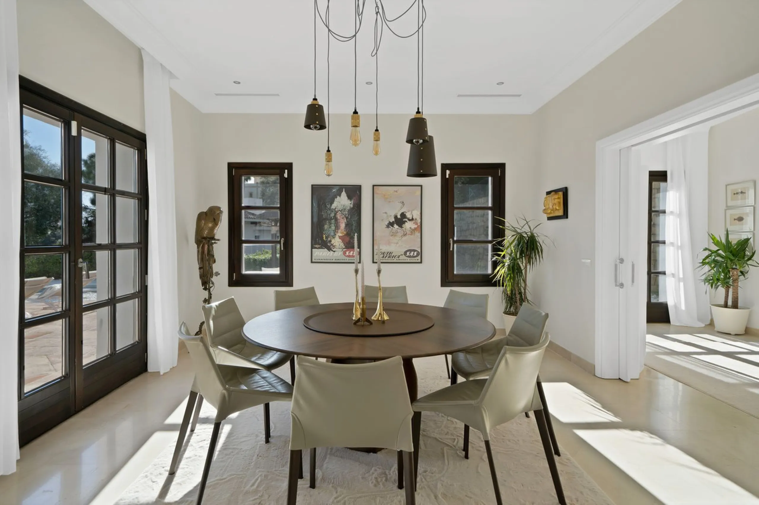 Set within the exclusive gated community of Monte Mayor, this exceptional south-facing detached villa offers breathtaking panoramic sea views from a generous 4,075m² plot. This villa stands out from most due to the elegant combination of Andalucian archit