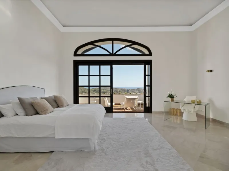 Set within the exclusive gated community of Monte Mayor, this exceptional south-facing detached villa offers breathtaking panoramic sea views from a generous 4,075m² plot. This villa stands out from most due to the elegant combination of Andalucian archit
