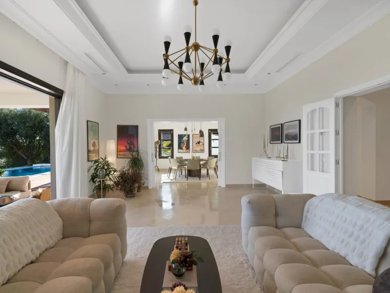 Set within the exclusive gated community of Monte Mayor, this exceptional south-facing detached villa offers breathtaking panoramic sea views from a generous 4,075m² plot. This villa stands out from most due to the elegant combination of Andalucian archit