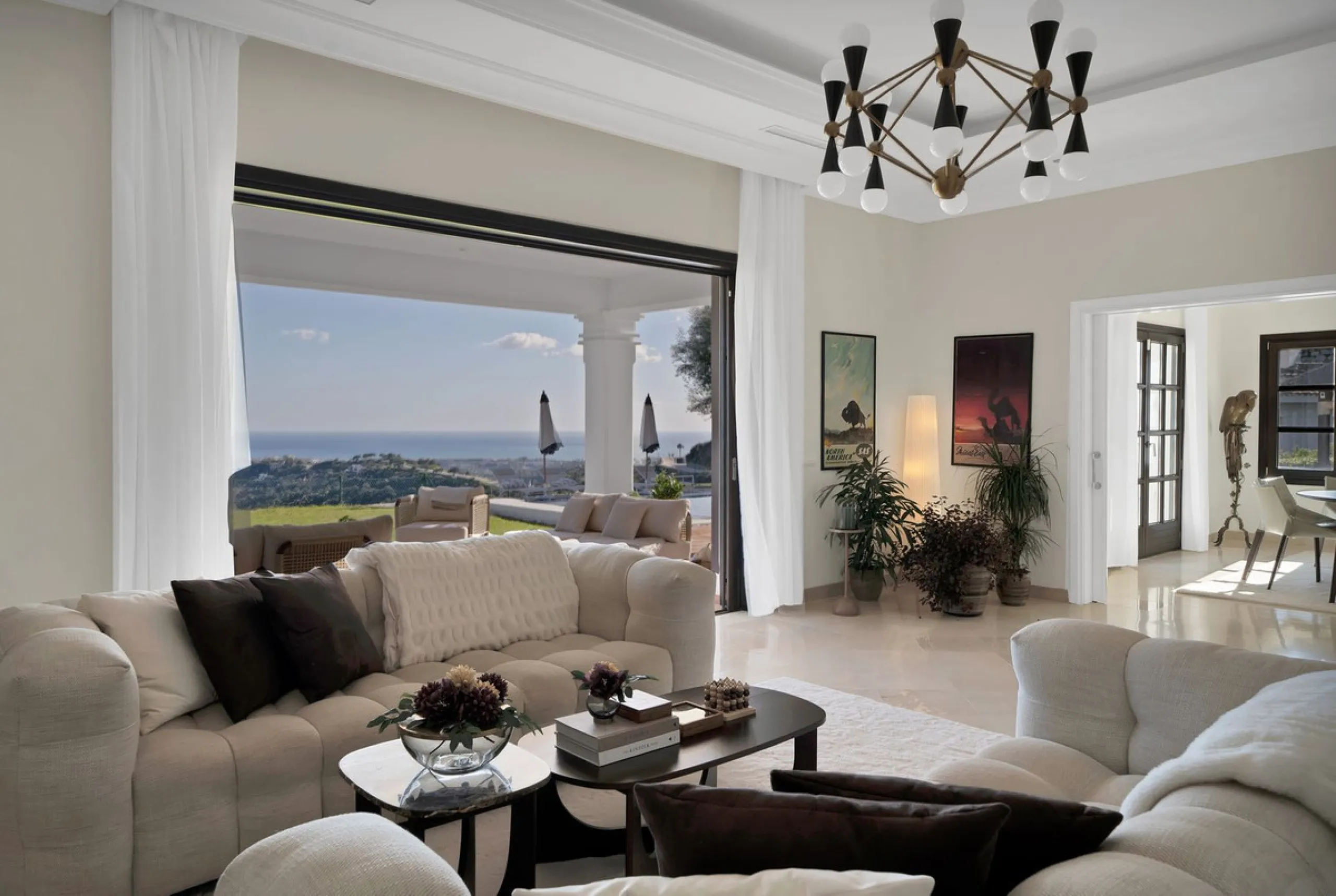 Set within the exclusive gated community of Monte Mayor, this exceptional south-facing detached villa offers breathtaking panoramic sea views from a generous 4,075m² plot. This villa stands out from most due to the elegant combination of Andalucian archit