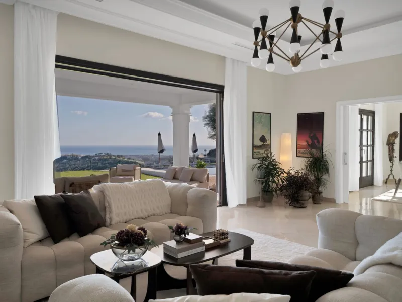 Set within the exclusive gated community of Monte Mayor, this exceptional south-facing detached villa offers breathtaking panoramic sea views from a generous 4,075m² plot. This villa stands out from most due to the elegant combination of Andalucian archit