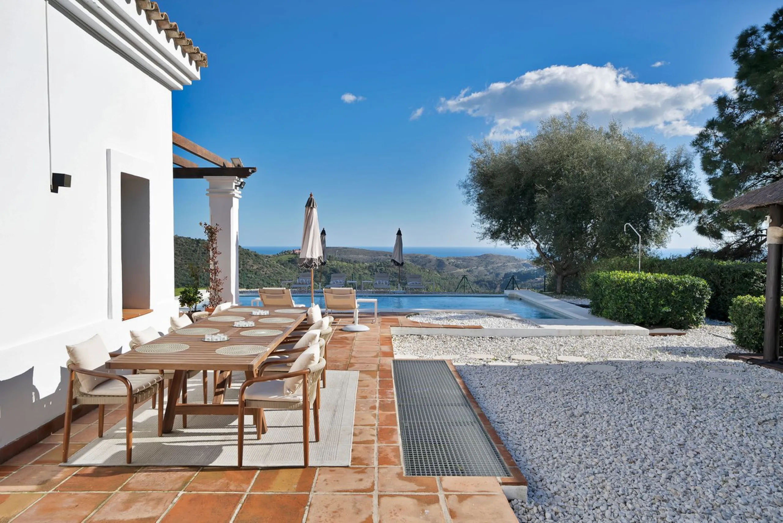 Set within the exclusive gated community of Monte Mayor, this exceptional south-facing detached villa offers breathtaking panoramic sea views from a generous 4,075m² plot. This villa stands out from most due to the elegant combination of Andalucian archit