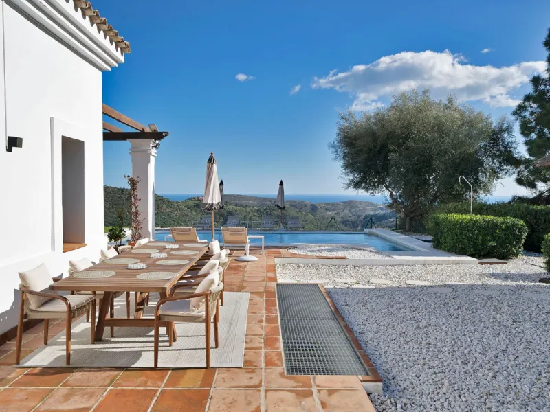 Set within the exclusive gated community of Monte Mayor, this exceptional south-facing detached villa offers breathtaking panoramic sea views from a generous 4,075m² plot. This villa stands out from most due to the elegant combination of Andalucian archit