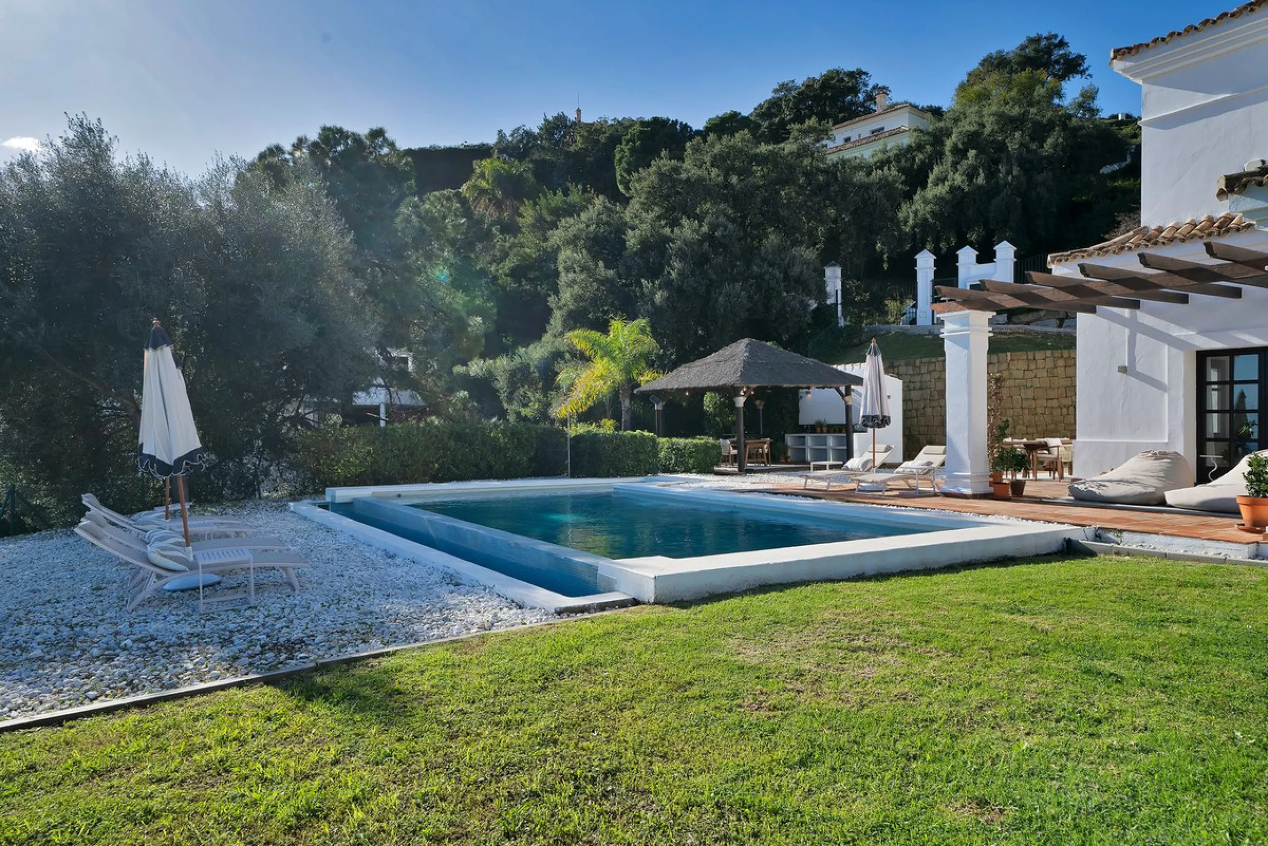 Set within the exclusive gated community of Monte Mayor, this exceptional south-facing detached villa offers breathtaking panoramic sea views from a generous 4,075m² plot. This villa stands out from most due to the elegant combination of Andalucian archit