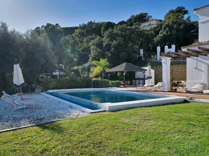 Set within the exclusive gated community of Monte Mayor, this exceptional south-facing detached villa offers breathtaking panoramic sea views from a generous 4,075m² plot. This villa stands out from most due to the elegant combination of Andalucian archit