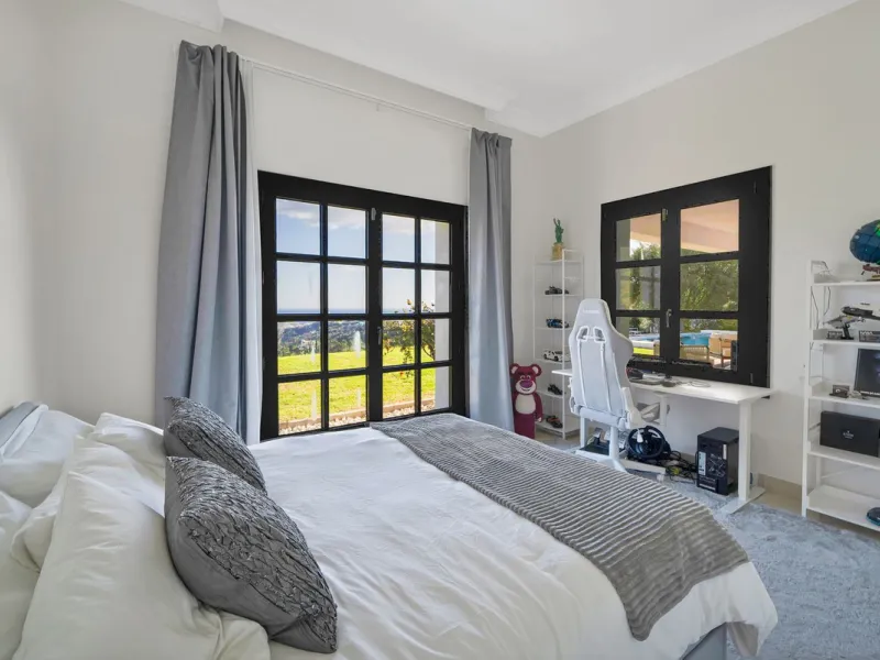 Set within the exclusive gated community of Monte Mayor, this exceptional south-facing detached villa offers breathtaking panoramic sea views from a generous 4,075m² plot. This villa stands out from most due to the elegant combination of Andalucian archit