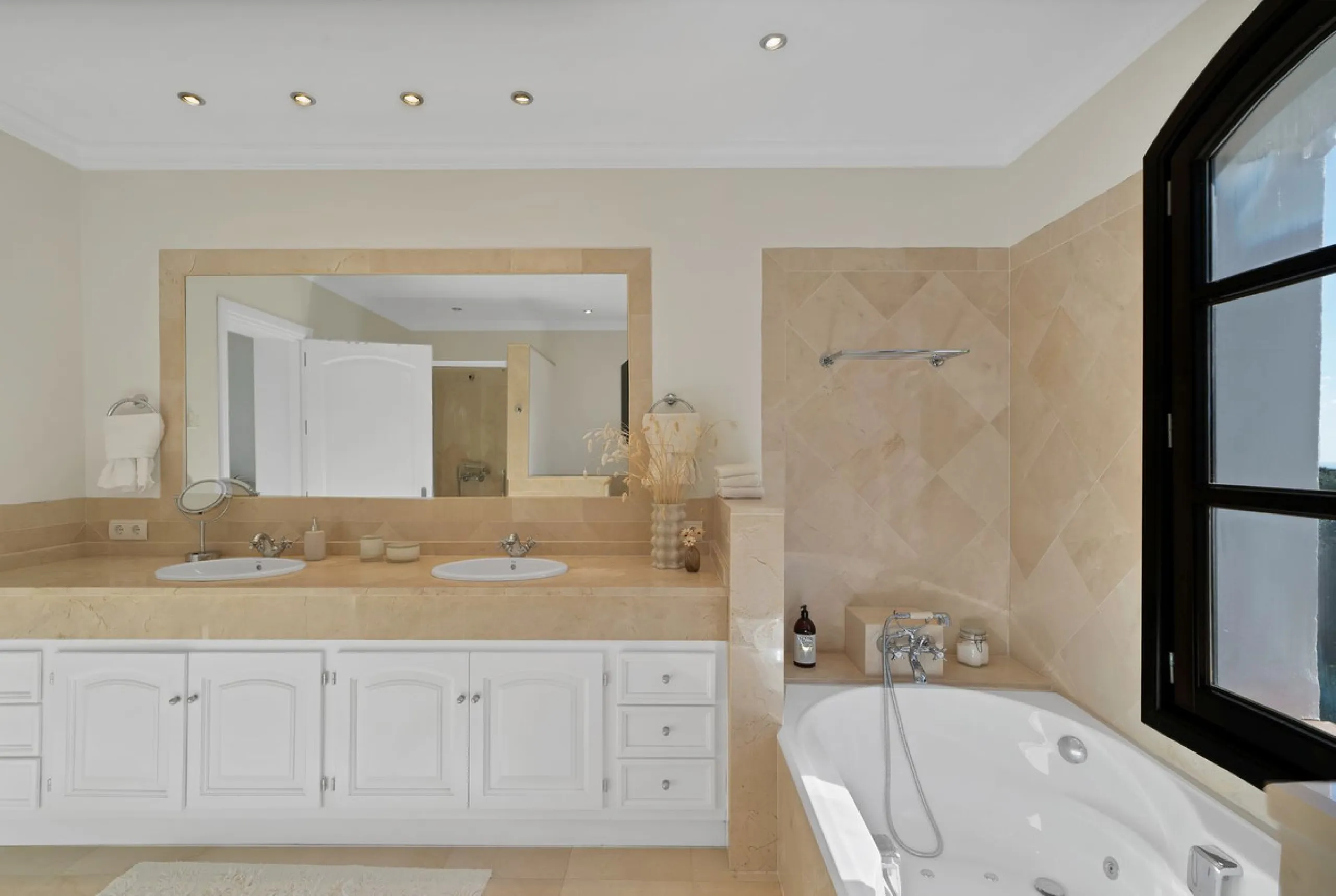 Set within the exclusive gated community of Monte Mayor, this exceptional south-facing detached villa offers breathtaking panoramic sea views from a generous 4,075m² plot. This villa stands out from most due to the elegant combination of Andalucian archit