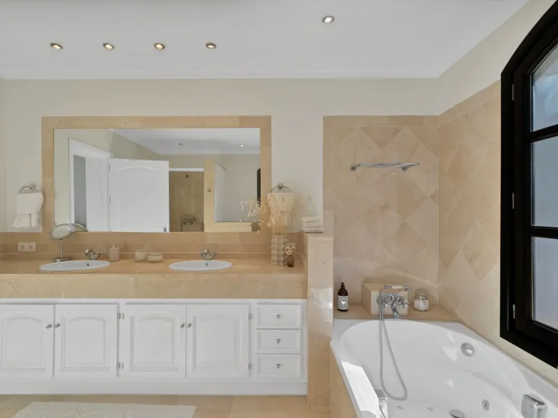 Set within the exclusive gated community of Monte Mayor, this exceptional south-facing detached villa offers breathtaking panoramic sea views from a generous 4,075m² plot. This villa stands out from most due to the elegant combination of Andalucian archit
