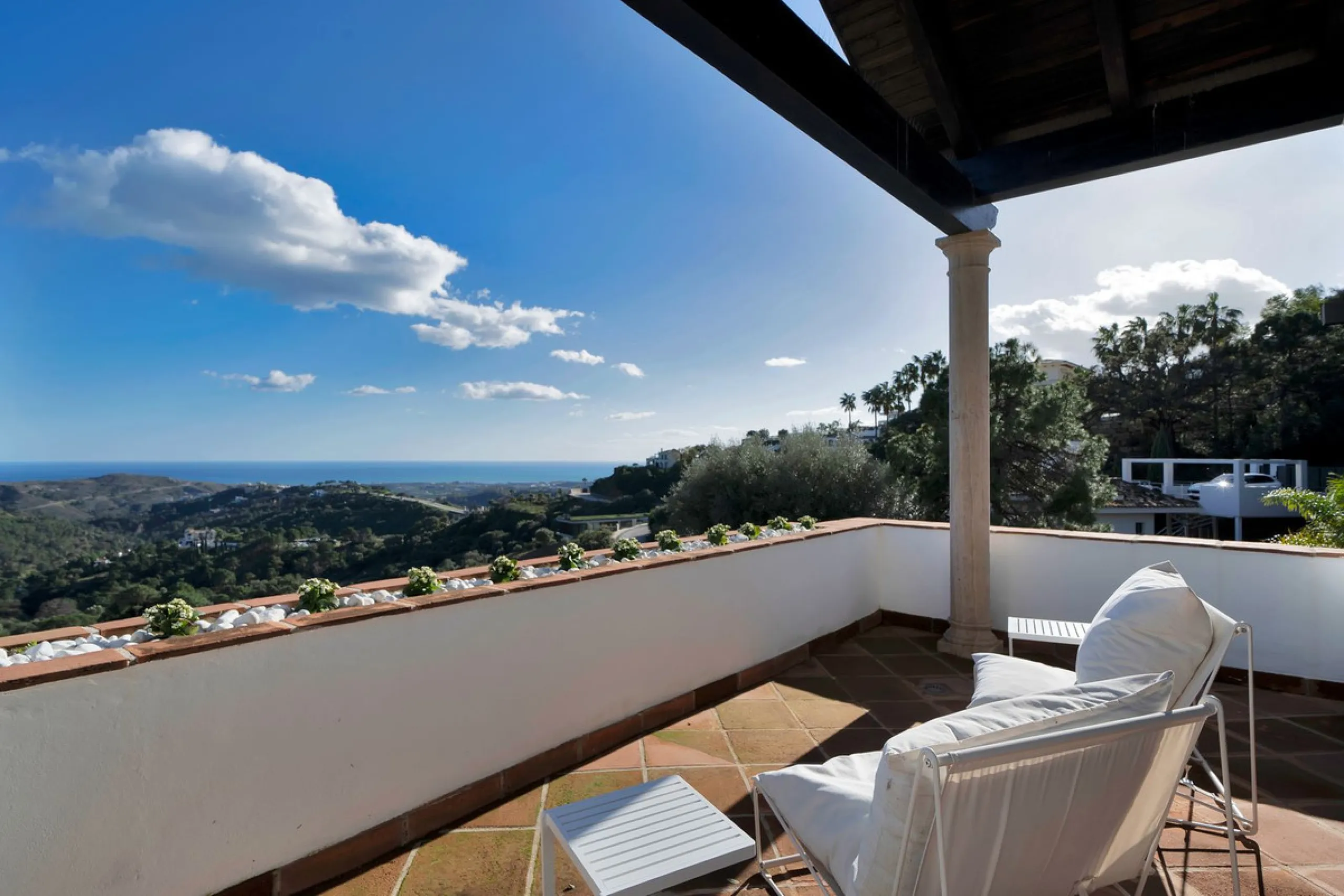 Set within the exclusive gated community of Monte Mayor, this exceptional south-facing detached villa offers breathtaking panoramic sea views from a generous 4,075m² plot. This villa stands out from most due to the elegant combination of Andalucian archit