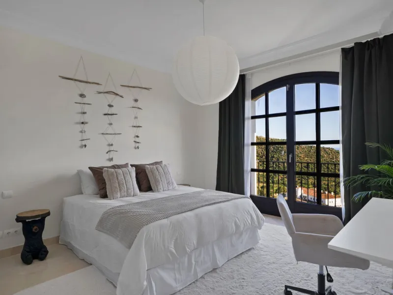 Set within the exclusive gated community of Monte Mayor, this exceptional south-facing detached villa offers breathtaking panoramic sea views from a generous 4,075m² plot. This villa stands out from most due to the elegant combination of Andalucian archit