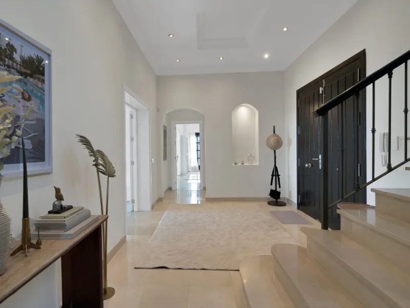 Set within the exclusive gated community of Monte Mayor, this exceptional south-facing detached villa offers breathtaking panoramic sea views from a generous 4,075m² plot. This villa stands out from most due to the elegant combination of Andalucian archit