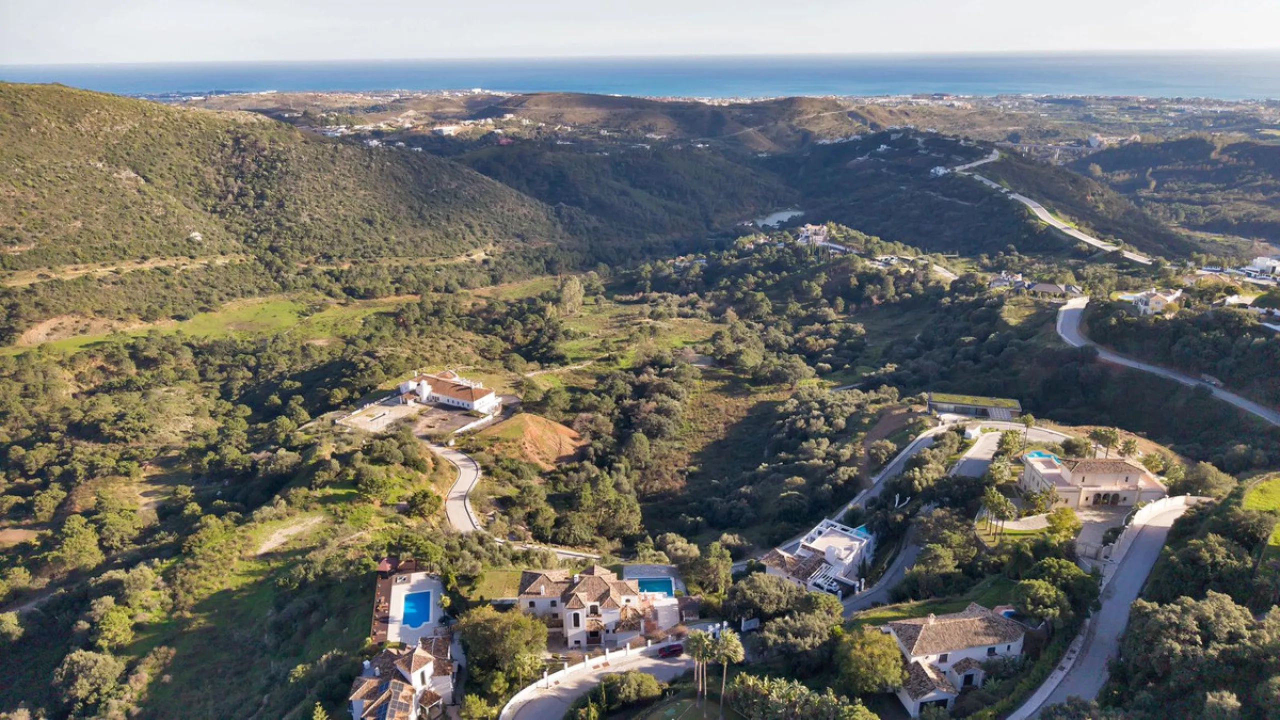 Set within the exclusive gated community of Monte Mayor, this exceptional south-facing detached villa offers breathtaking panoramic sea views from a generous 4,075m² plot. This villa stands out from most due to the elegant combination of Andalucian archit