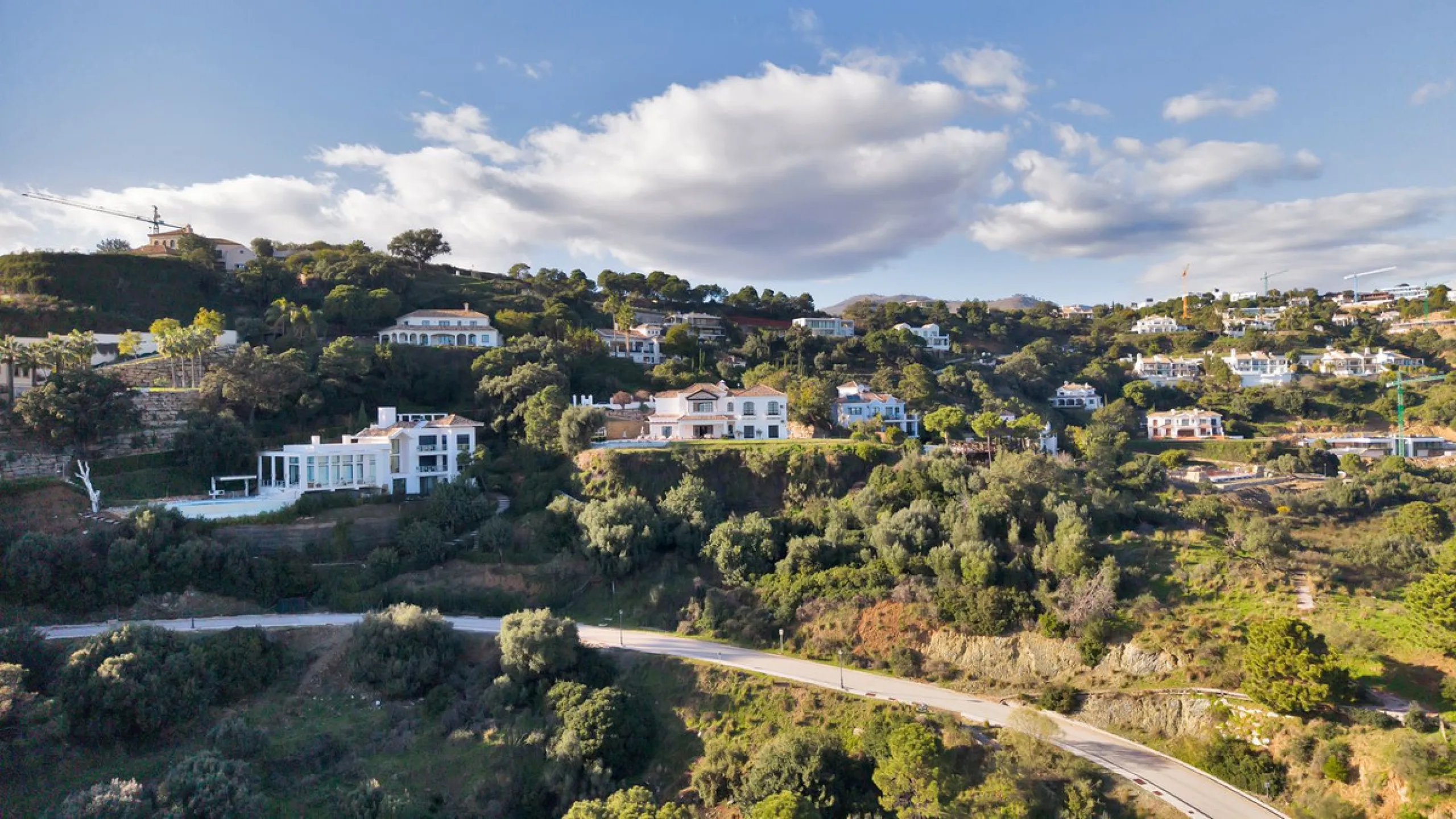 Set within the exclusive gated community of Monte Mayor, this exceptional south-facing detached villa offers breathtaking panoramic sea views from a generous 4,075m² plot. This villa stands out from most due to the elegant combination of Andalucian archit