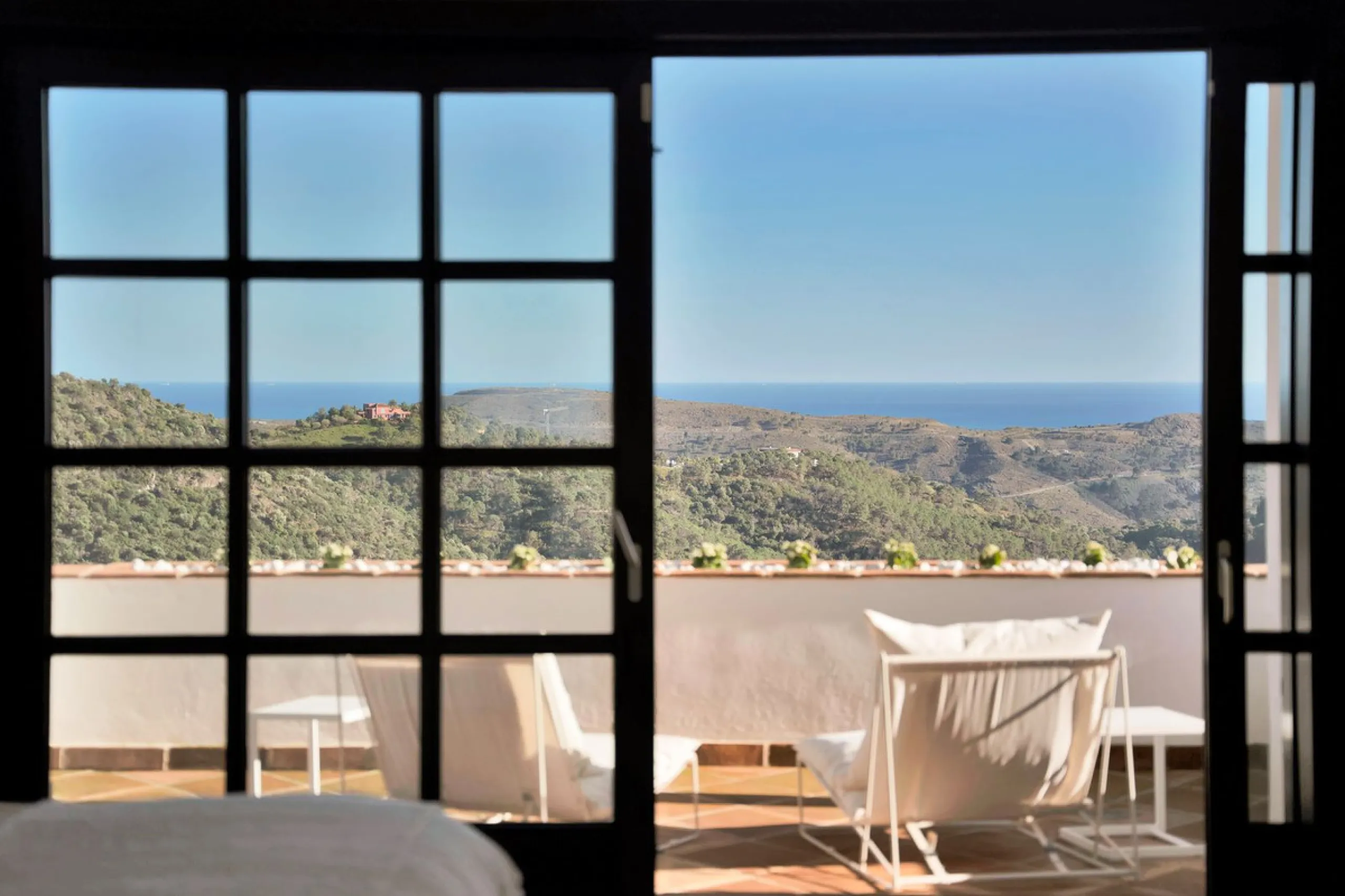 Set within the exclusive gated community of Monte Mayor, this exceptional south-facing detached villa offers breathtaking panoramic sea views from a generous 4,075m² plot. This villa stands out from most due to the elegant combination of Andalucian archit