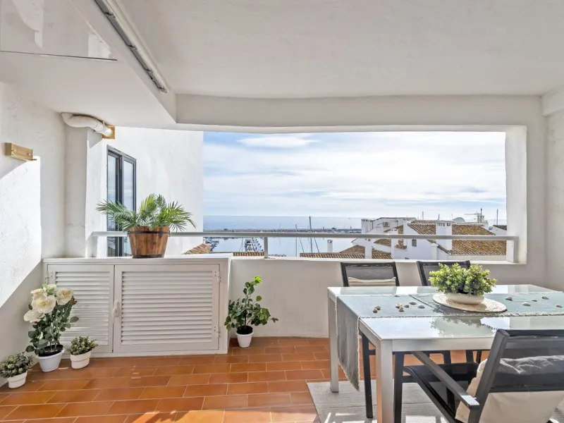 Elegant 2-bedroom, 2-bathroom apartment for sale in Puerto Banús, offering beautiful views of the port and a prime location in one of Marbella's most exclusive areas.
