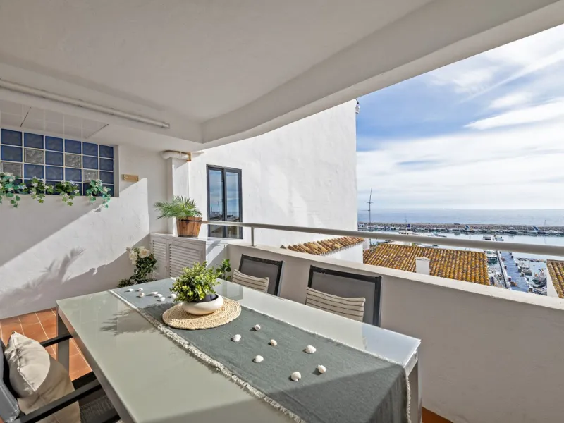 Elegant 2-bedroom, 2-bathroom apartment for sale in Puerto Banús, offering beautiful views of the port and a prime location in one of Marbella's most exclusive areas.