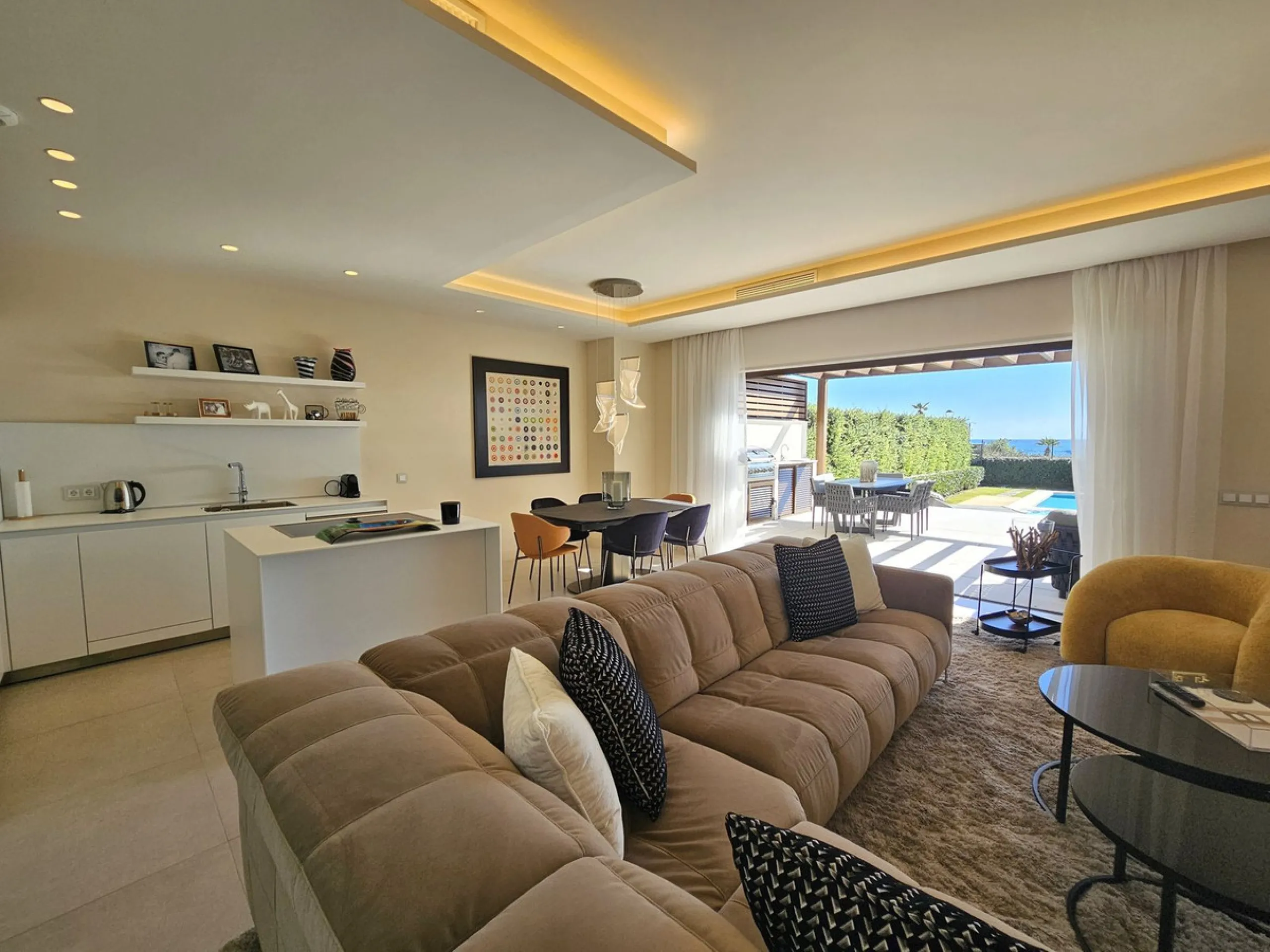 This beautiful house is located in an enviable beachfront position within the prestigious Velaya development on the New Golden Mile, offering breathtaking sea views and direct access to the beach.
