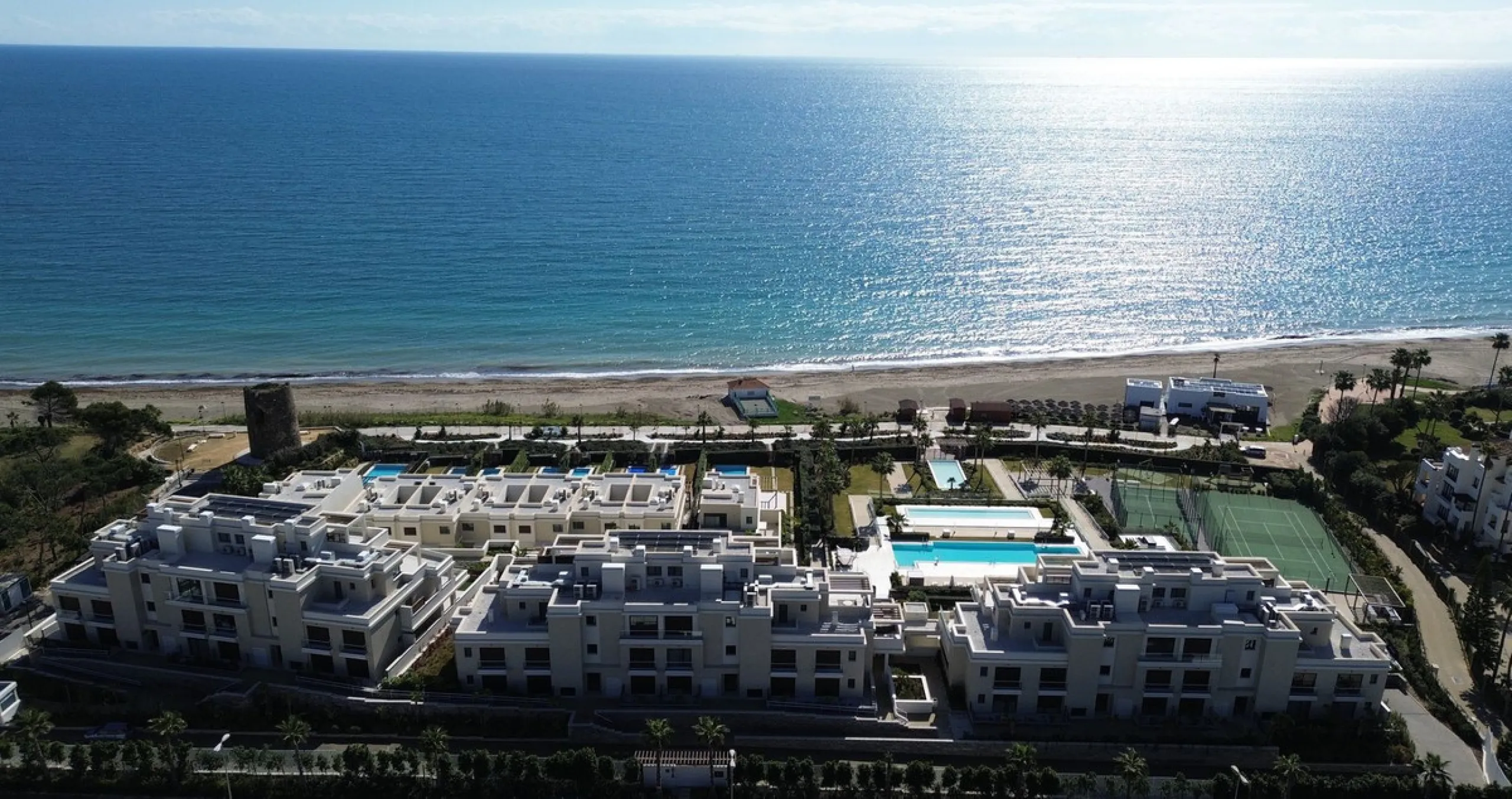 This beautiful house is located in an enviable beachfront position within the prestigious Velaya development on the New Golden Mile, offering breathtaking sea views and direct access to the beach.