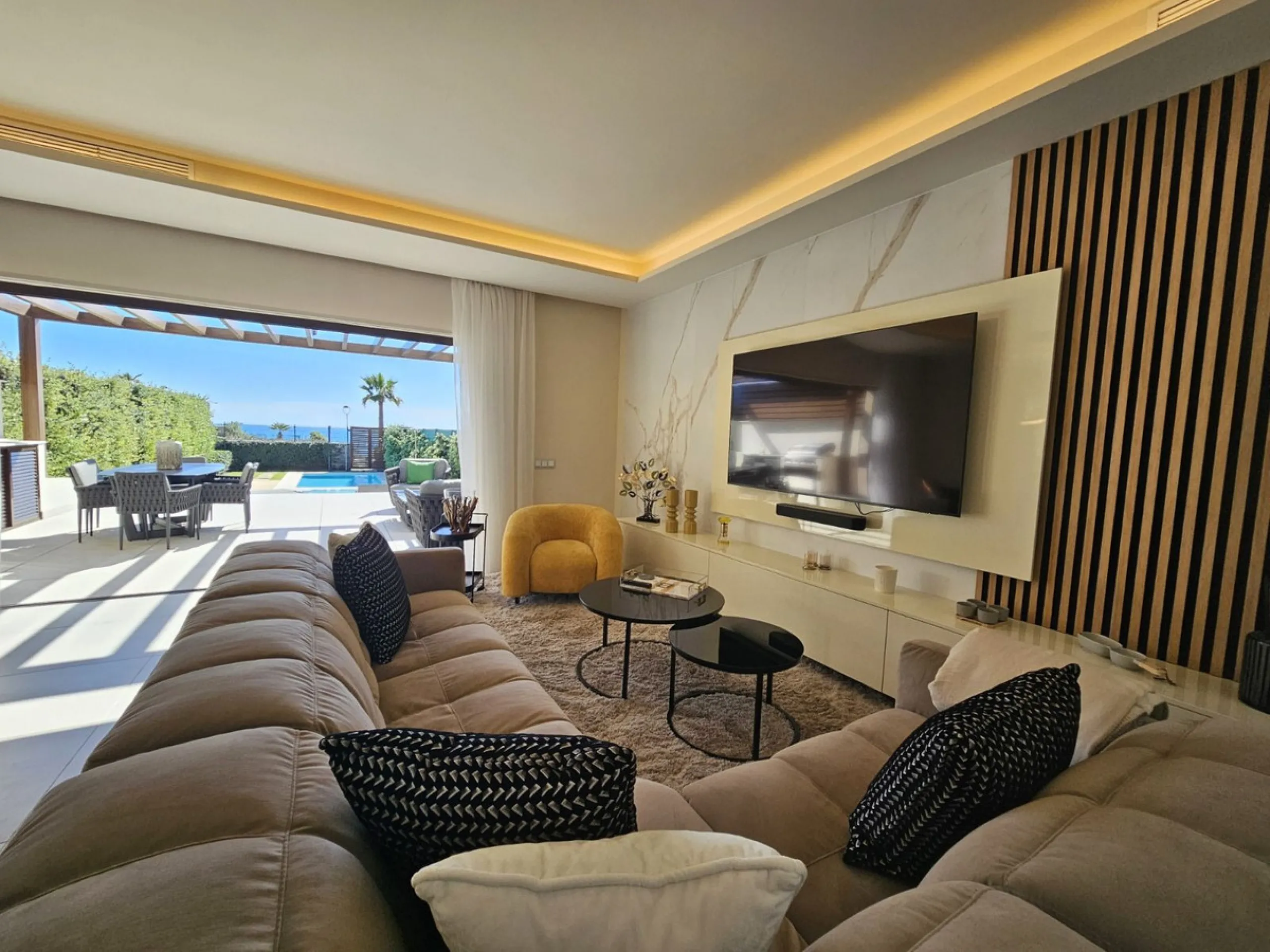 This beautiful house is located in an enviable beachfront position within the prestigious Velaya development on the New Golden Mile, offering breathtaking sea views and direct access to the beach.