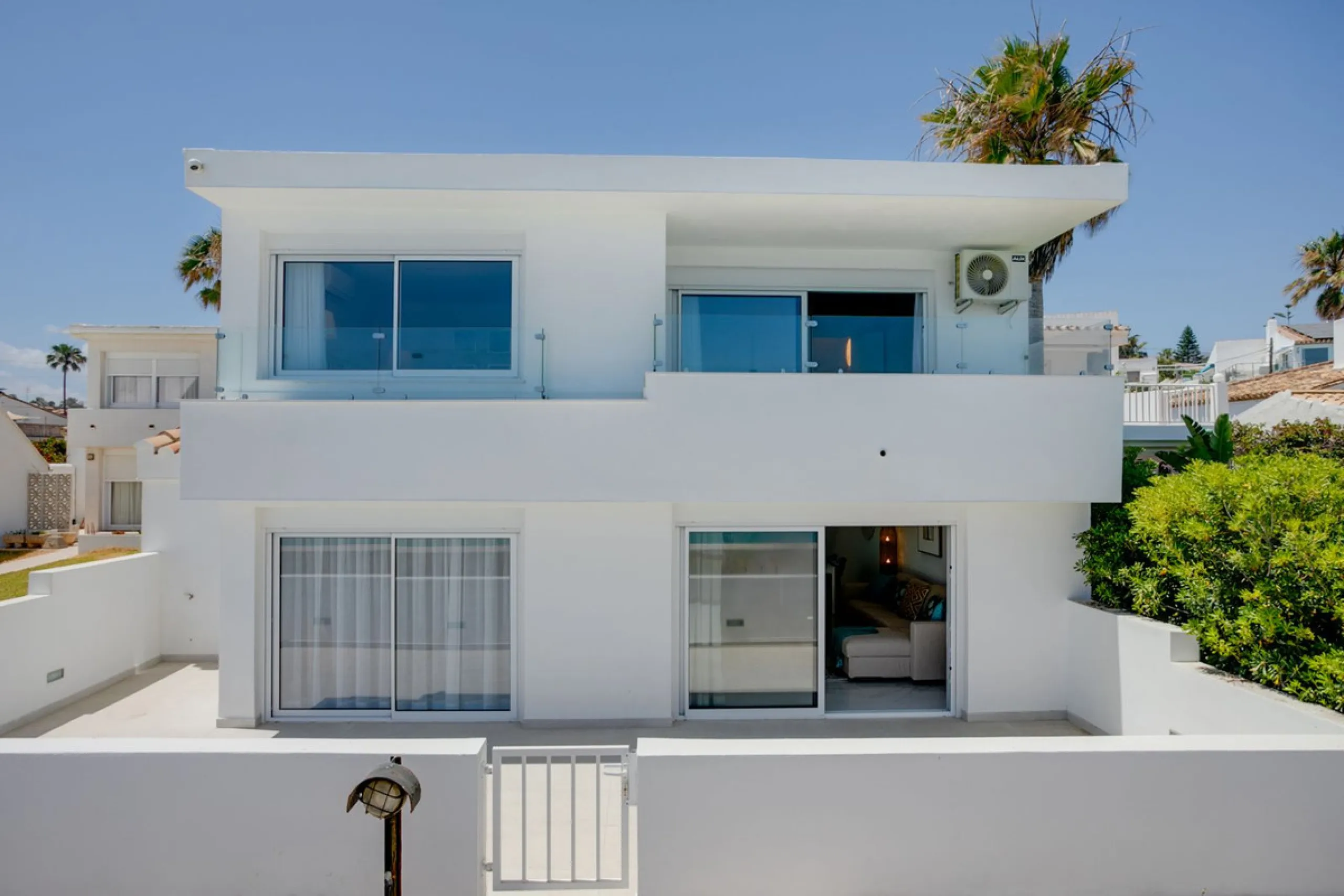 A beautifully renovated beachfront villa with perfect sea views. The house has been tastefully modernised to offer a large open plan living room with fully fitted modern kitchen, on the lower level is also one of the 3 bedrooms with bathroom.
