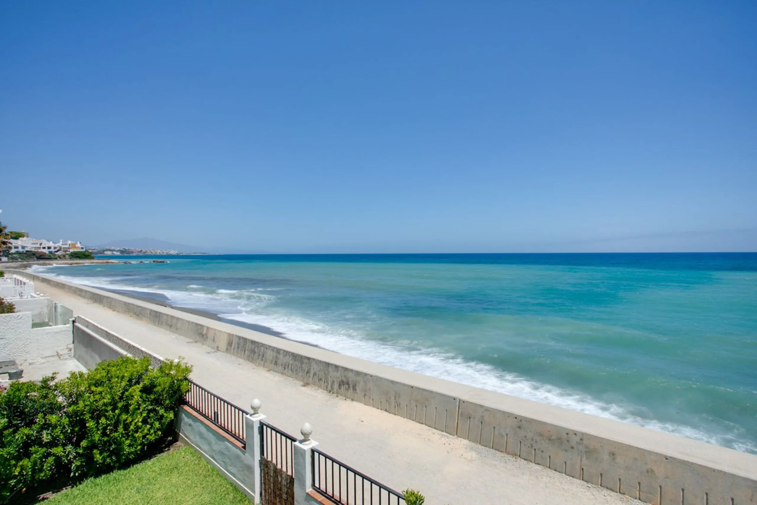 A beautifully renovated beachfront villa with perfect sea views. The house has been tastefully modernised to offer a large open plan living room with fully fitted modern kitchen, on the lower level is also one of the 3 bedrooms with bathroom.