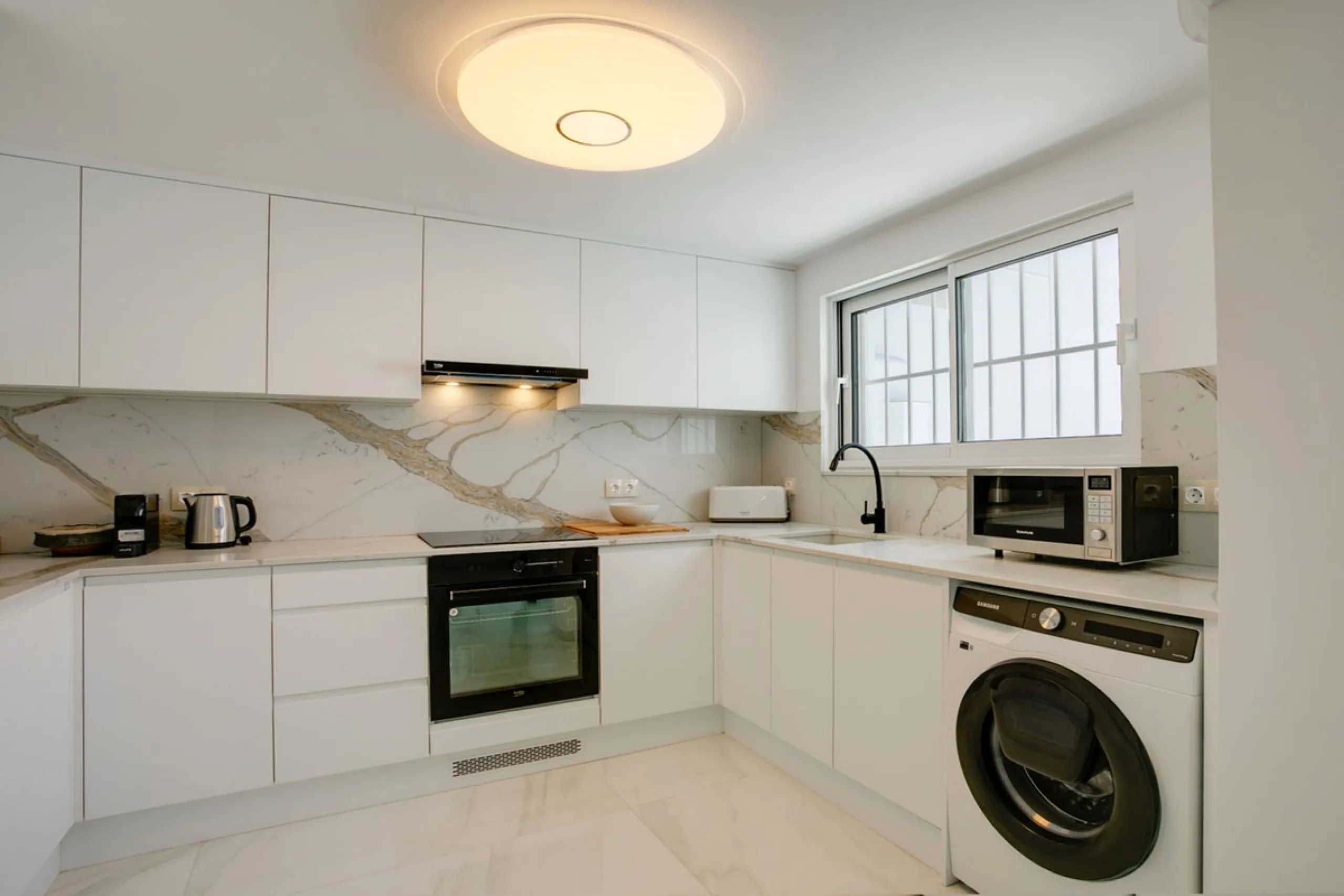 A beautifully renovated beachfront villa with perfect sea views. The house has been tastefully modernised to offer a large open plan living room with fully fitted modern kitchen, on the lower level is also one of the 3 bedrooms with bathroom.