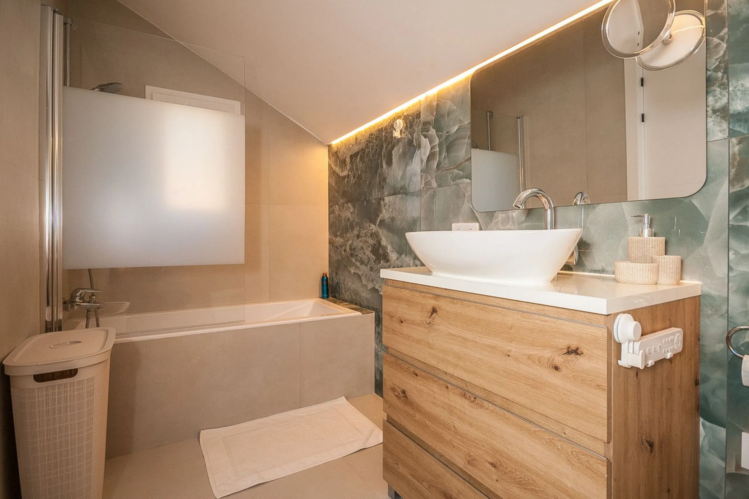 Discover your dream retreat in this stunning two-bedroom penthouse, where breathtaking views await you at every turn. Featuring a modernized kitchen and bathrooms, this residence combines style and functionality. Enjoy the convenience of underground parki