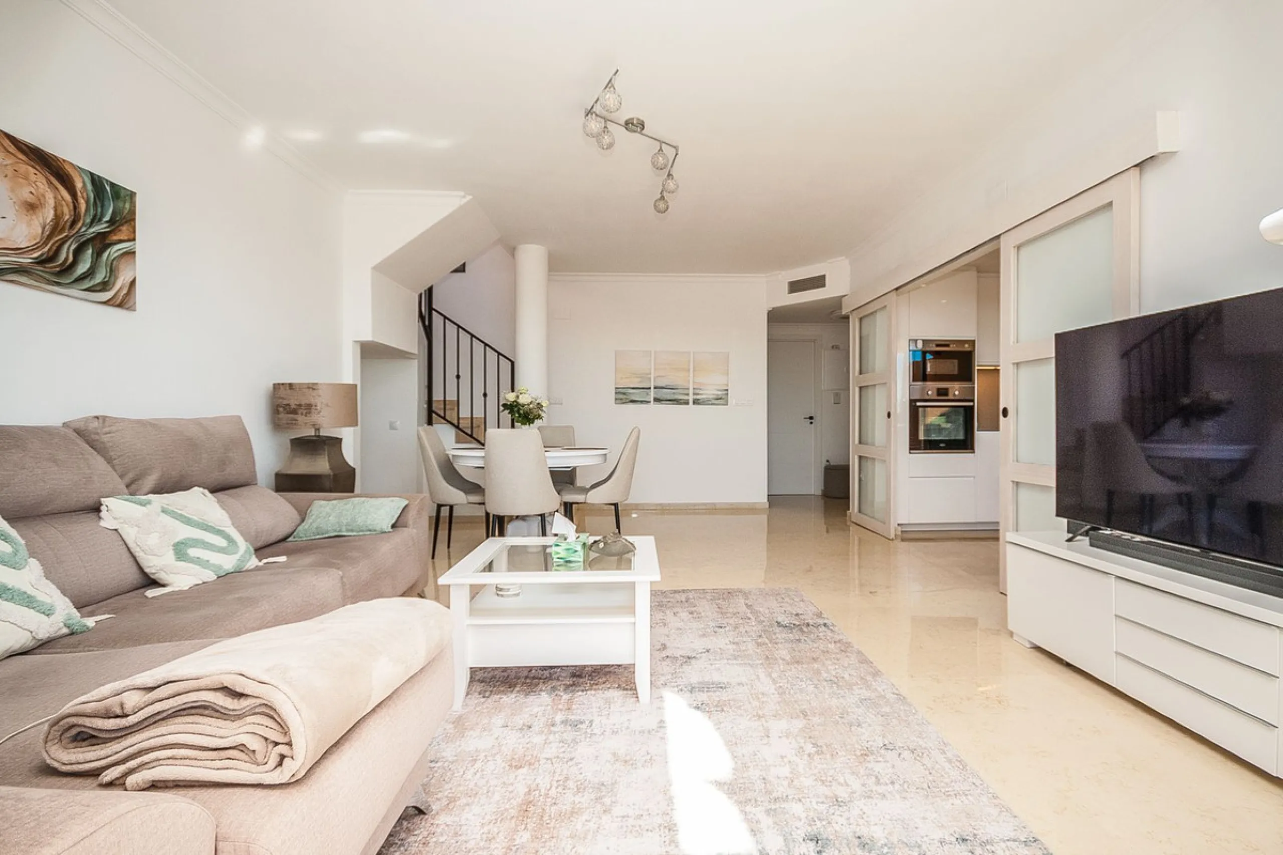 Discover your dream retreat in this stunning two-bedroom penthouse, where breathtaking views await you at every turn. Featuring a modernized kitchen and bathrooms, this residence combines style and functionality. Enjoy the convenience of underground parki