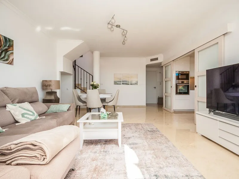 Discover your dream retreat in this stunning two-bedroom penthouse, where breathtaking views await you at every turn. Featuring a modernized kitchen and bathrooms, this residence combines style and functionality. Enjoy the convenience of underground parki