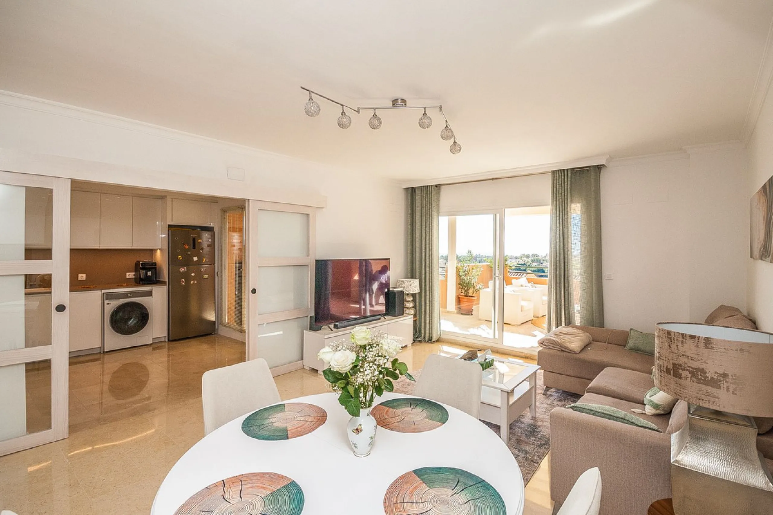 Discover your dream retreat in this stunning two-bedroom penthouse, where breathtaking views await you at every turn. Featuring a modernized kitchen and bathrooms, this residence combines style and functionality. Enjoy the convenience of underground parki