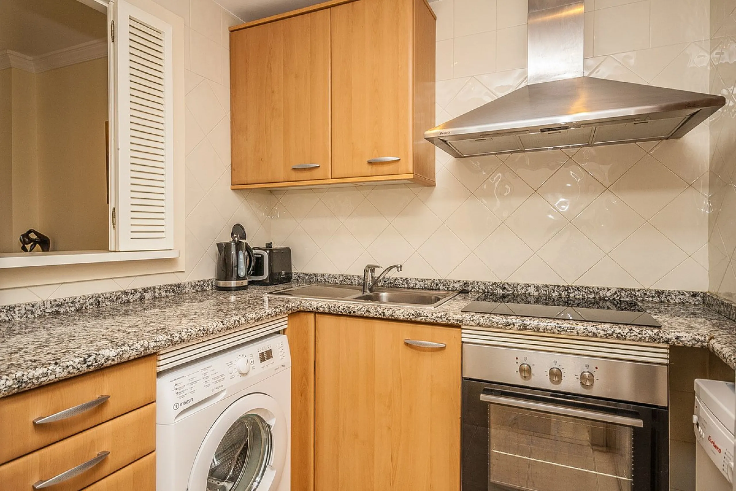 Discover your dream home in this immaculate two-bedroom apartment, perfectly situated just a short stroll from the beach and a vibrant array of restaurants and cafes. This ready-to-move-in residence offers the convenience of a dedicated parking space and 