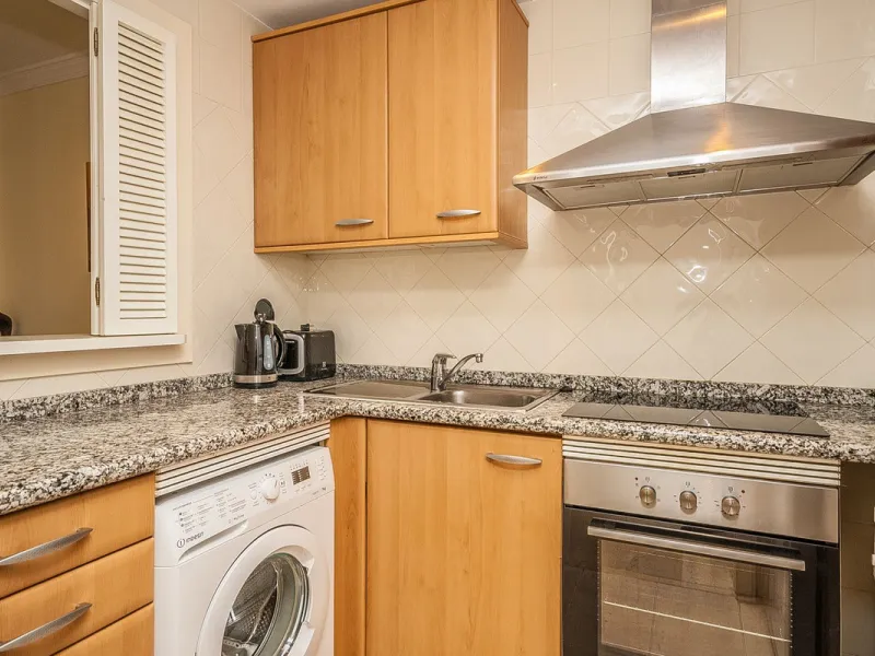 Discover your dream home in this immaculate two-bedroom apartment, perfectly situated just a short stroll from the beach and a vibrant array of restaurants and cafes. This ready-to-move-in residence offers the convenience of a dedicated parking space and 