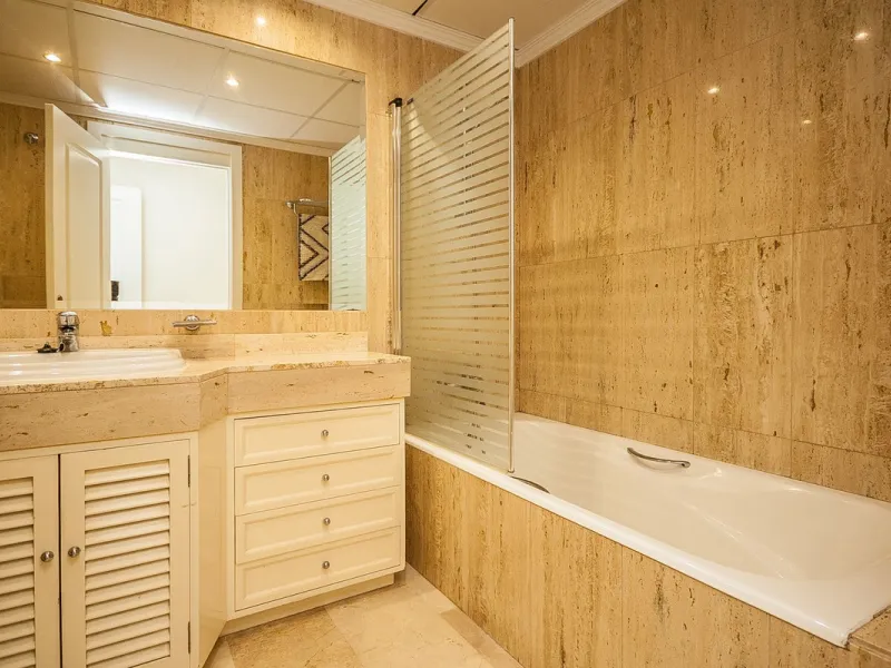 Discover your dream home in this immaculate two-bedroom apartment, perfectly situated just a short stroll from the beach and a vibrant array of restaurants and cafes. This ready-to-move-in residence offers the convenience of a dedicated parking space and 