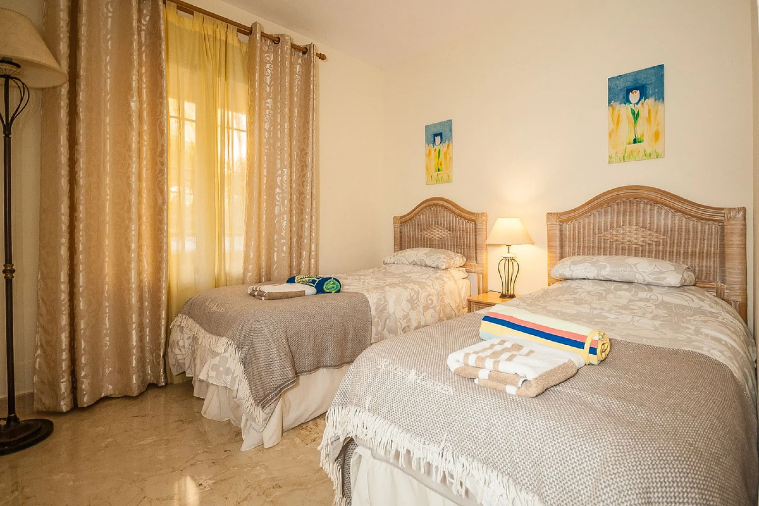 Discover your dream home in this immaculate two-bedroom apartment, perfectly situated just a short stroll from the beach and a vibrant array of restaurants and cafes. This ready-to-move-in residence offers the convenience of a dedicated parking space and 