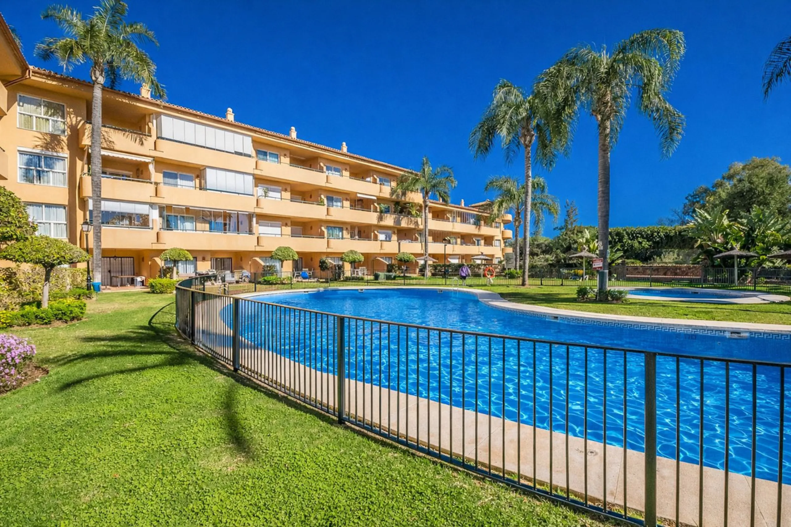 Discover your dream home in this immaculate two-bedroom apartment, perfectly situated just a short stroll from the beach and a vibrant array of restaurants and cafes. This ready-to-move-in residence offers the convenience of a dedicated parking space and 