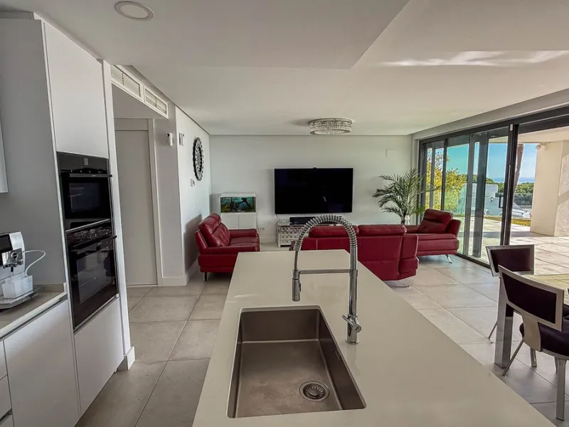 Absolutely stunning, spacious, bright and totally  luxurious   apartment with private garden and pool, enjoying panoramic seaviews.