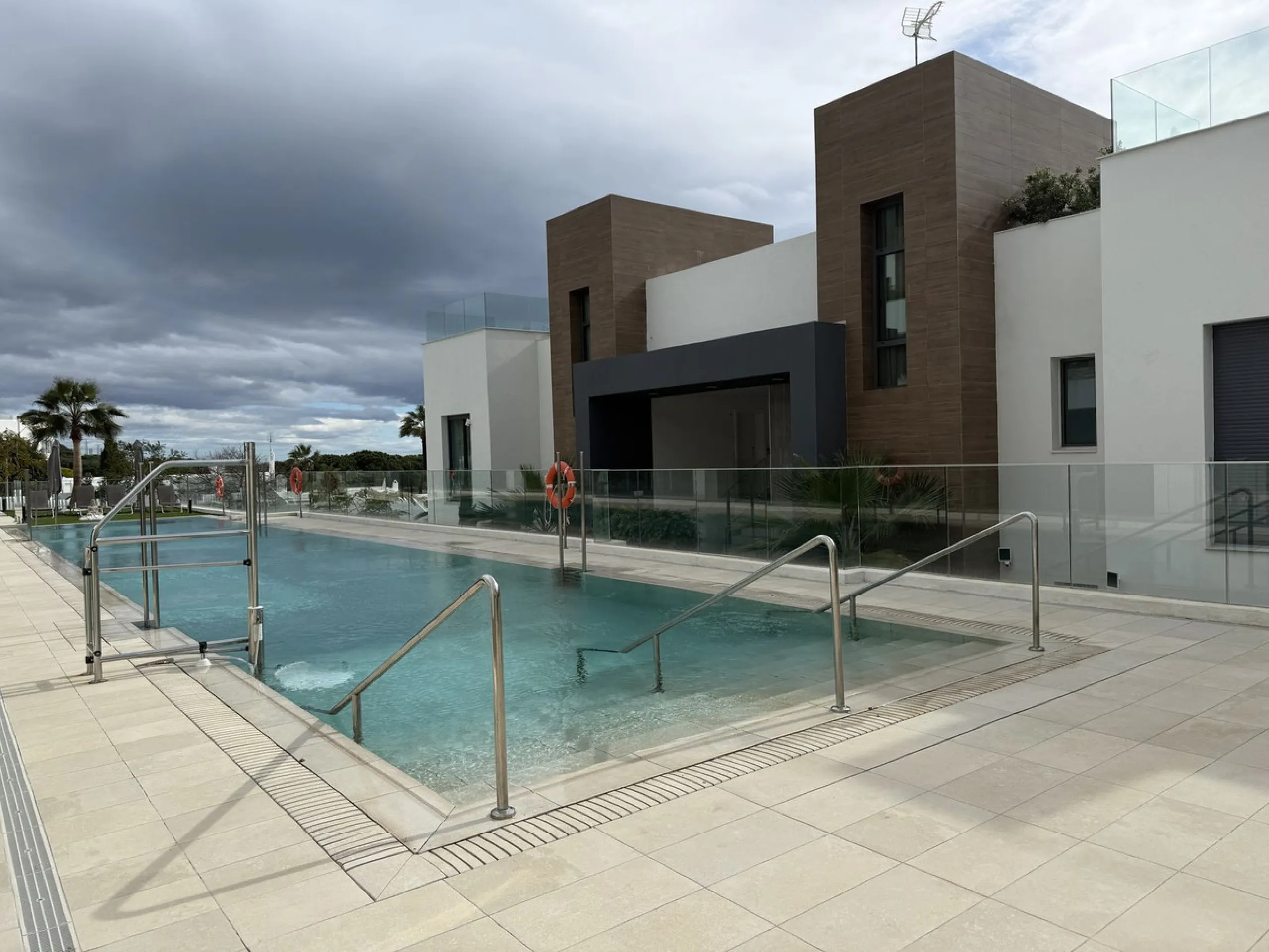 Absolutely stunning, spacious, bright and totally  luxurious   apartment with private garden and pool, enjoying panoramic seaviews.